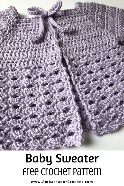 Baby sweater that is the color of black raspberry ice cream. The crochet pattern is part of the ice cream social collection.