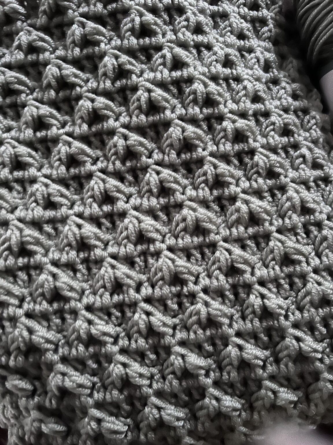 View of Baile Textured Baby Blanket Free Crochet Pattern - Ambassador Crochet